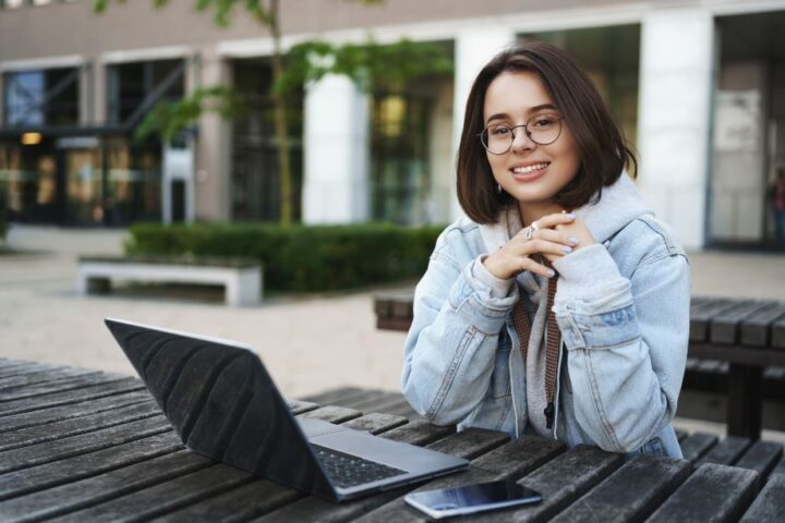 girl smiling after registering for spanish language course in delhi